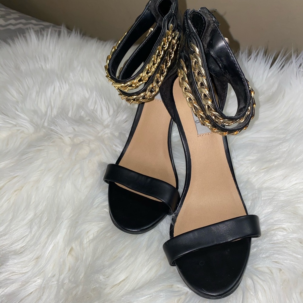 Black and gold heels